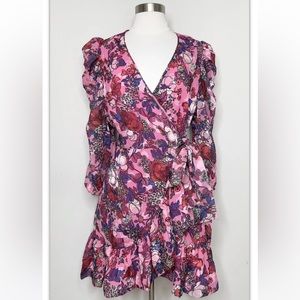 Tanya Taylor, Vibrant florals on this wrap dress with Victorian flair sleeves.